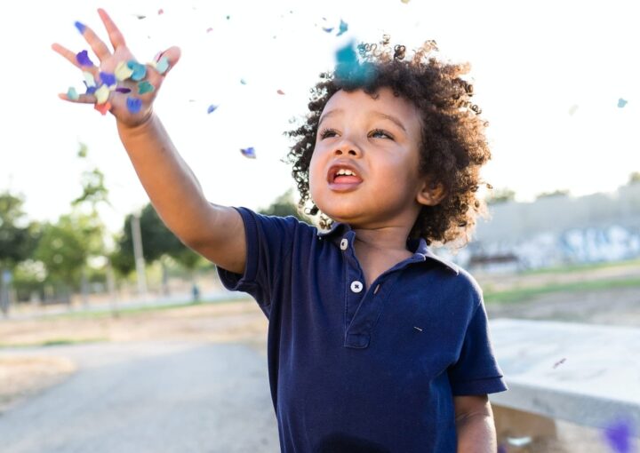 African american baby having fun in the park.