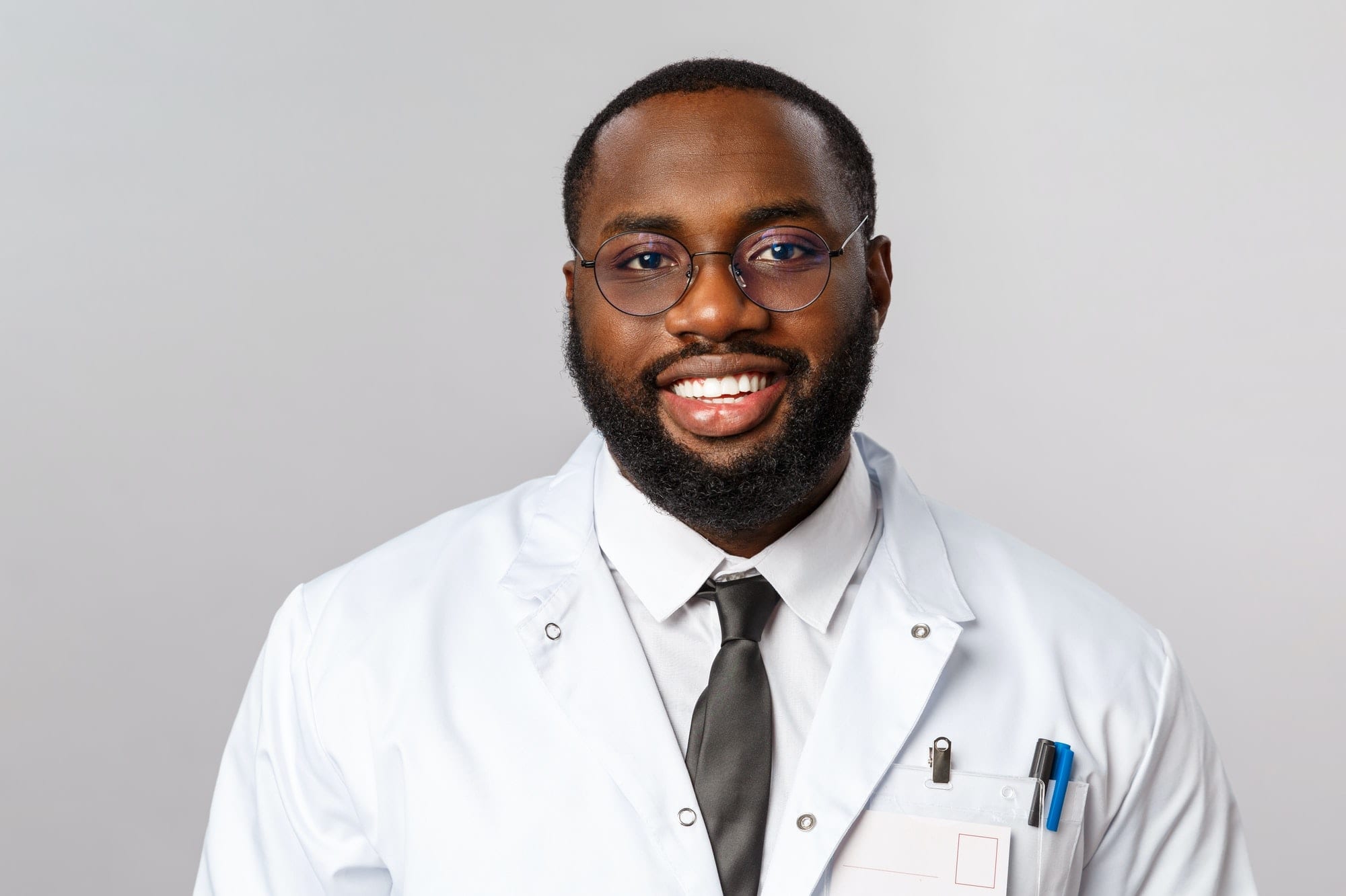 Young African-American Doctor on Grey