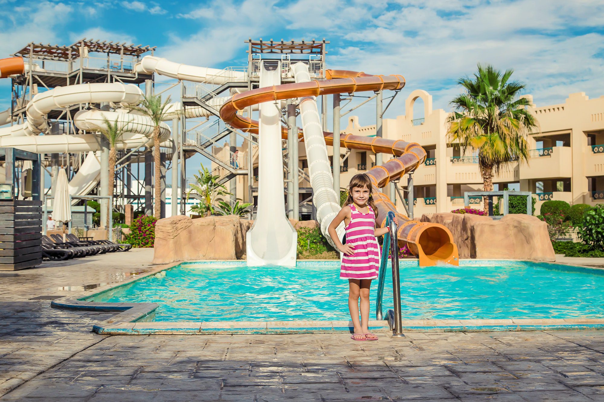 child in the water park. Preparing for swimming. Selective focus.